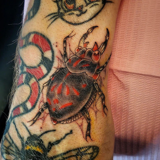 Explore covering up name tattoos ideas, creative tattoo ideas in Palm Harbor, available at Angry Owl Tattoo and Piercing
