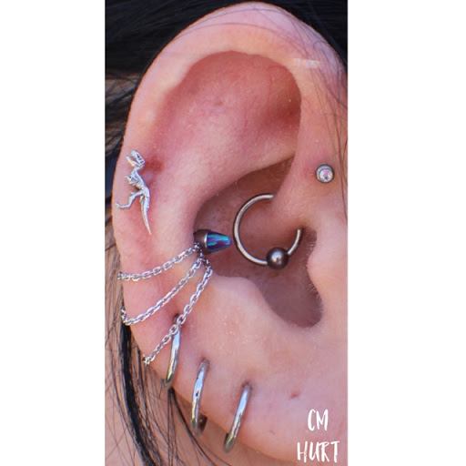 Explore thin line tattoo ideas, creative tattoo ideas in Garden Grove, available at CM Hurt Piercing & Jewelry