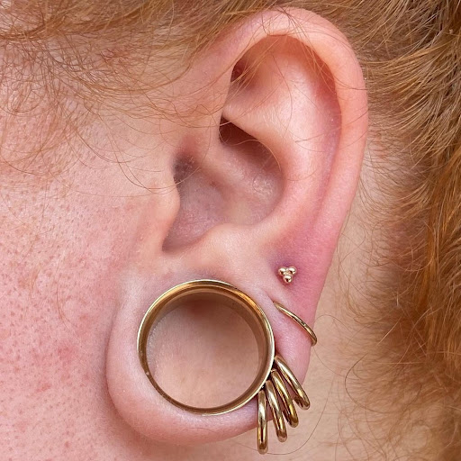Explore money bag tattoo ideas, creative tattoo ideas in Winter Haven, available at Pinkys Place Winter Haven