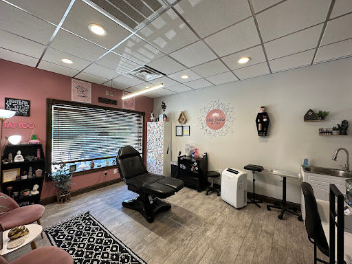 Find tattoo between breast ideas for your next unique tattoo in Maysville at Pink Dahlia Tattoo LLC