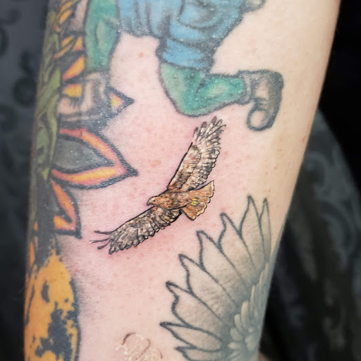 Explore forearm tattoo filler ideas, creative tattoo ideas in Mebane, available at The Cardinal Skin Art & Gallery