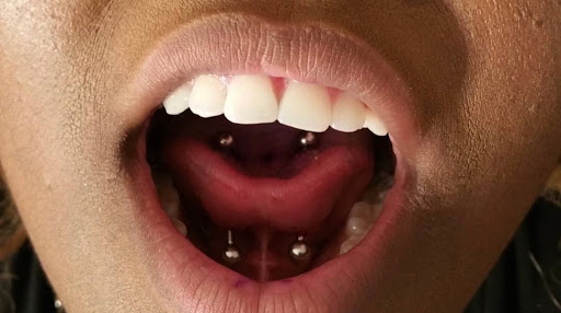 Explore double heart tattoo ideas, creative tattoo ideas in Milwaukee, available at Piercings Plus