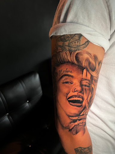 Explore arm tattoo ideas flowers, creative tattoo ideas in Downey, available at Superior Ink Tattoo and Piercings
