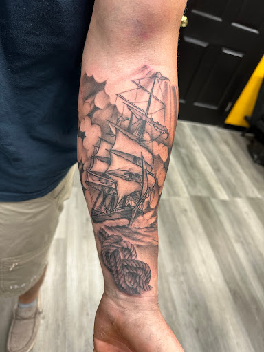 Explore male forearm tattoos ideas, creative tattoo ideas in Avon Park, available at Lions Den Ink Studio at The Collective