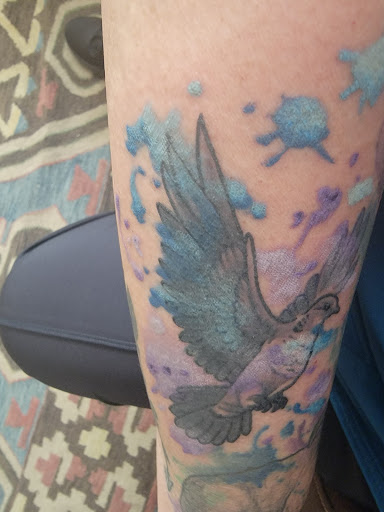 Explore dog memorial tattoo ideas, creative tattoo ideas in Tucson, available at Enchanted Dragon