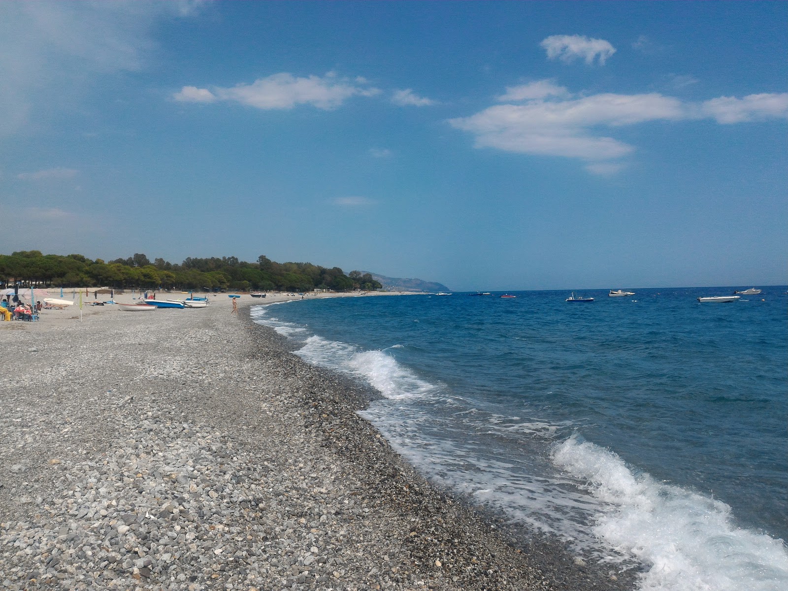 Fotografie cu Spiaggia Cundufuri Marina cu o suprafață de apa albastra