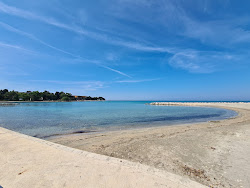 Umag Sand Beach'in fotoğrafı geniş bir kıyı şeridi ile birlikte