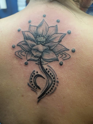 Explore feminine dragon tattoo ideas, creative tattoo ideas in Spokane, available at Sweet Inks & Cool Peeps