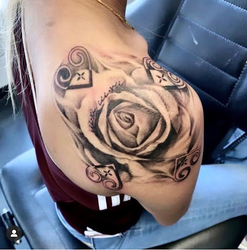 Explore tiger lily tattoo ideas, creative tattoo ideas in Minneapolis, available at Ink Addictionz Tattoo