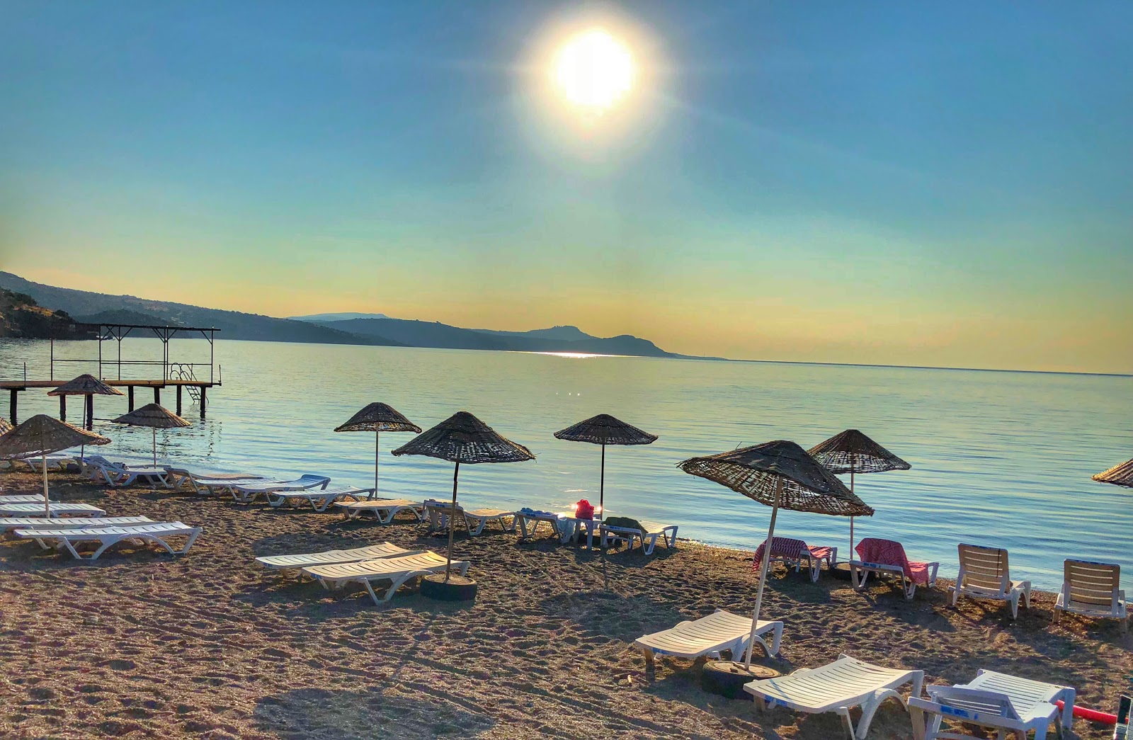 Photo of Last Ship beach with turquoise pure water surface