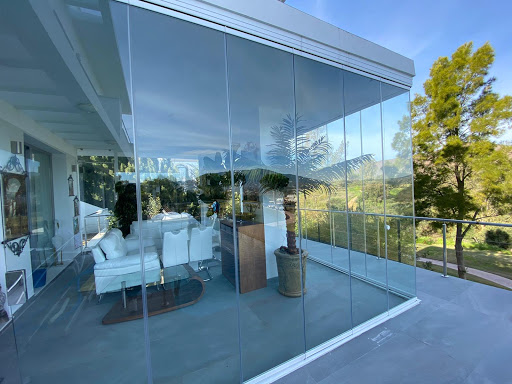 Cerramientos Tejero Granada - Cortinas de cristal - Pérgolas bioclimáticas