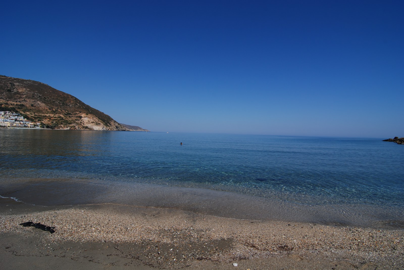 Foto av East Beach med turkosa vatten yta