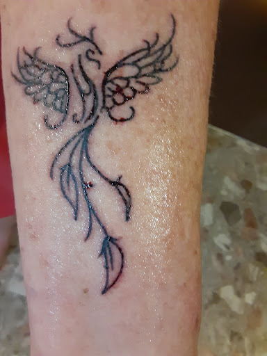 Explore unique knee tattoo ideas, creative tattoo ideas in Conway, available at Primal Urge Tattoos