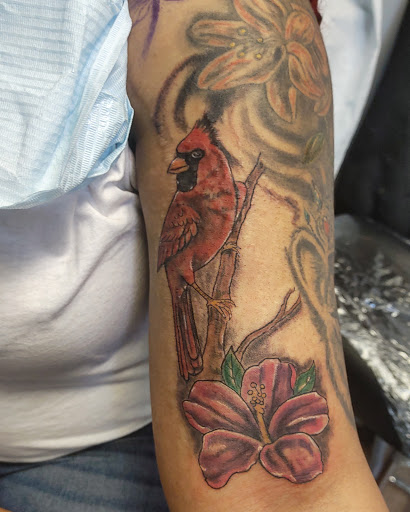 Explore black female tattoos ideas, creative tattoo ideas in Saint Paul, available at No Joke Tattoo Studios