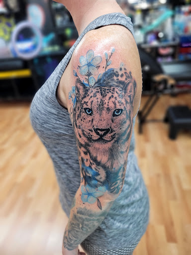 Explore family tree tattoo idea, creative tattoo ideas in Benton, available at Spectrum Tattoo