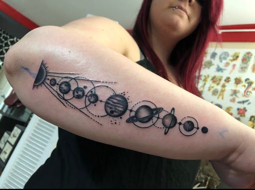 Explore forearm tattoo ideas simple, creative tattoo ideas in Kingsford, available at Deft Tattoo Studio