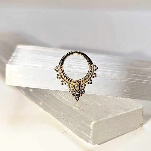 Find middle boob tattoo ideas for your next unique tattoo in Vancouver at Poppys Parlour LLC