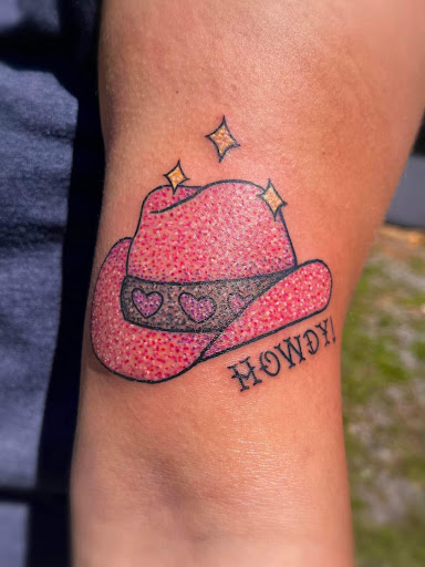 Explore tattoo on thigh ideas, creative tattoo ideas in Benton, available at Spectrum Tattoo