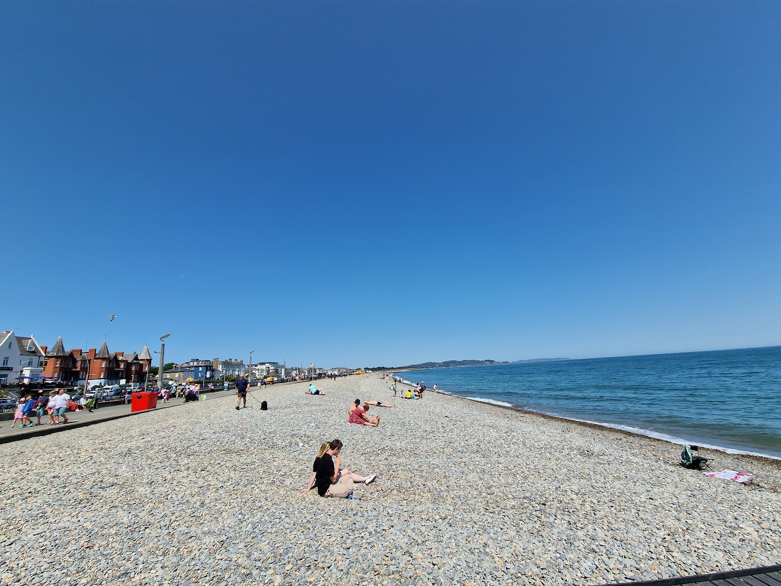 Photo of Bray Strand with turquoise pure water surface