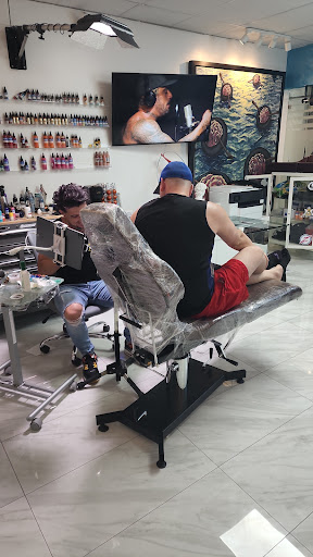 Explore ouroboros tattoo ideas, creative tattoo ideas in Coral Springs, available at MB Tattoo Studio