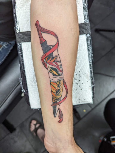 Explore praying hands tattoo ideas, creative tattoo ideas in Cadillac, available at Warchief Tattoo, LLC