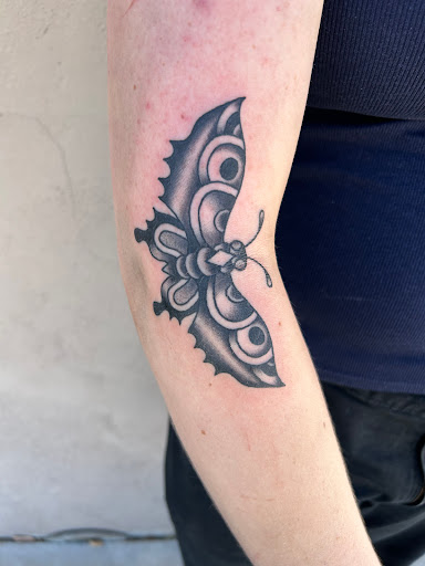 Explore tattoo scroll ideas, creative tattoo ideas in Albuquerque, available at Holy Fool Tattoo Club