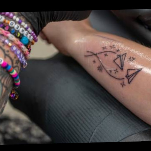 Explore england tattoo ideas, creative tattoo ideas in Lees Summit, available at The Cherry Bomb Tattoo Co.