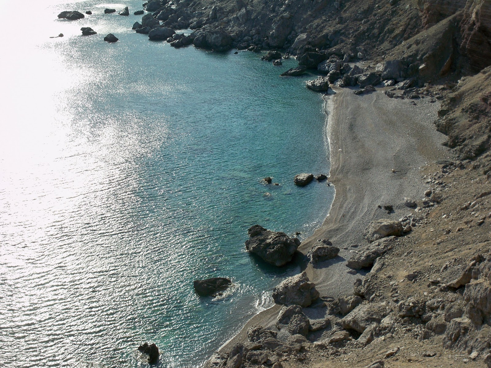 Foto av Kalami beach med grå sten yta