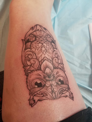 Explore blue jay tattoo ideas, creative tattoo ideas in Salina, available at Iron Street Tattoo and Body Piercing