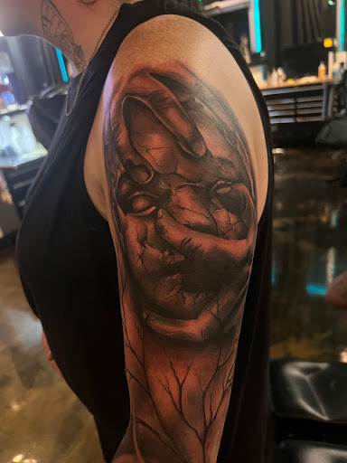 Find tattoo ideas for upper arm men for your next unique tattoo in Dallas at Controversy Ink Tattoo Studio