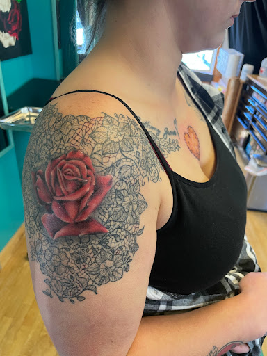 Explore mens upper back tattoo ideas, creative tattoo ideas in Hayward, available at Three Tentacles Tattoo Studio