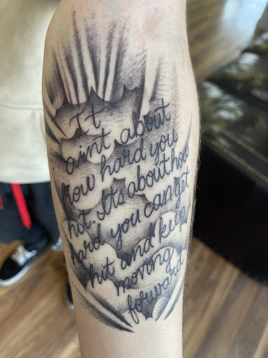 Explore upper arm men tattoo ideas, creative tattoo ideas in Albuquerque, available at Albuquerque Ink tattoo College Plaza