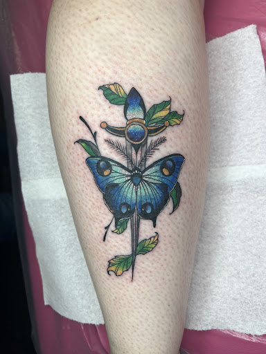 Explore back of leg tattoo ideas, creative tattoo ideas in Lake City, available at Crooked Spines Tattoo Studio