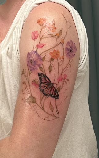 Explore august birth flower tattoo ideas, creative tattoo ideas in Brighton, available at Monaree Ink
