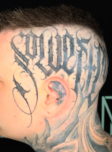 Explore batman logo tattoo ideas, creative tattoo ideas in Hollywood, available at Sacred Eye Tattoos