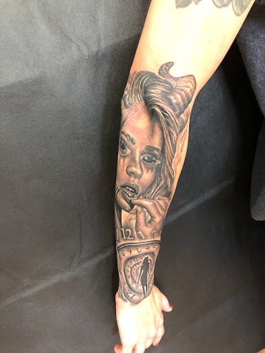 Explore simple dragon tattoo ideas, creative tattoo ideas in Sarasota, available at SEVEN SINS Tattoo Studio