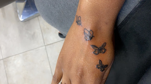 Explore ladies wrist tattoo ideas, creative tattoo ideas in Jacksonville, available at Dark Seas Tattoo and Piercing