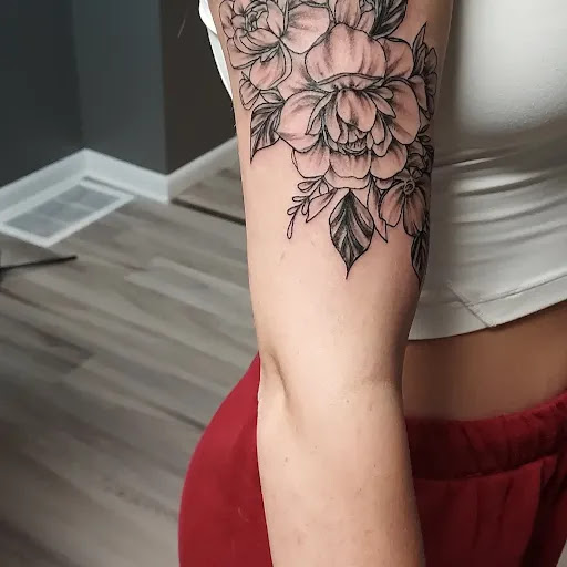Explore dragon tattoo ideas for ladies, creative tattoo ideas in Conowingo, available at In Bloom Tattoo