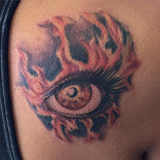 Explore shoulder cap tattoo ideas, creative tattoo ideas in Chapel Hill, available at Golden Falcon Tattoo and Piercing