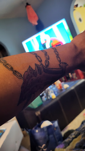 Explore tattoo ideas for thigh, creative tattoo ideas in Saint Paul, available at Black Coffin Tattoo