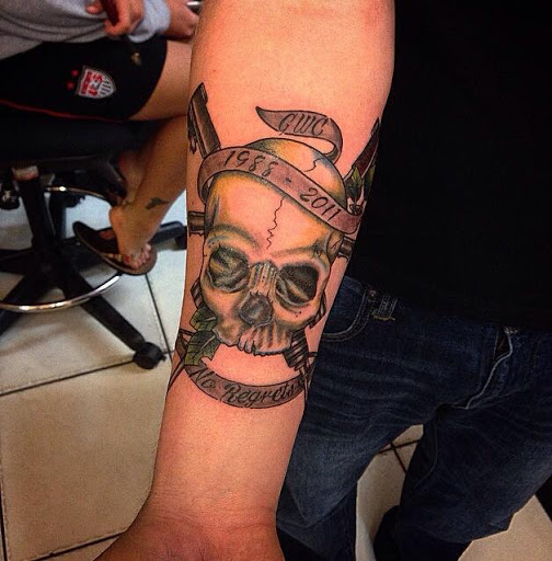 Explore tricep tattoo ideas for guys, creative tattoo ideas in Kingsford, available at Deft Tattoo Studio