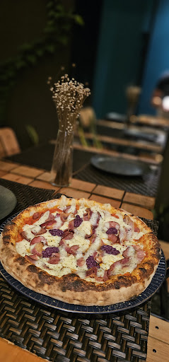 Logo da empresa - Pizzeria Pedaços