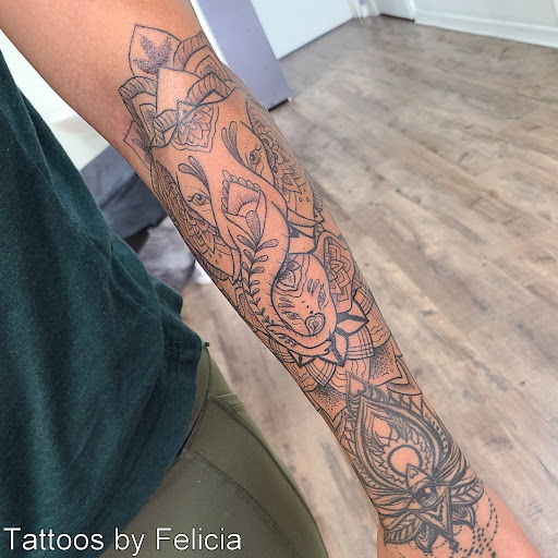 Explore tattoos behind ear ideas, creative tattoo ideas in Fort Myers, available at Tiger Lotus Tattoo and Piercing