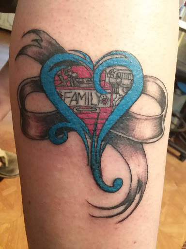 Explore lung cancer ribbon tattoo ideas, creative tattoo ideas in Carbondale, available at MsCandyTattoo