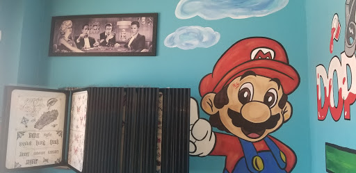 Tattoo Shop «Dope Inkk Tattoo», reviews and photos, 6658 Hillandale Dr A, Lithonia, GA 30058, USA
