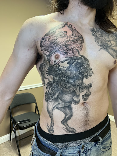 Explore religious tattoo sleeve ideas, creative tattoo ideas in Bethesda, available at Ravens Tattoo Shop