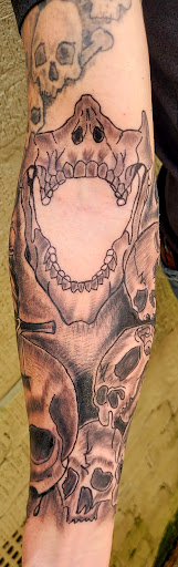 Explore dog and cat tattoo ideas, creative tattoo ideas in Meridian, available at SK-Tattoo1