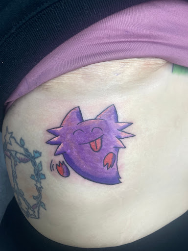 Find rib tattoo ideas for females for your next unique tattoo in Buford at Wild Tribe Tattoos and Piercings