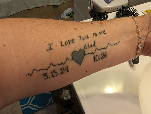 Explore rose thigh tattoo ideas, creative tattoo ideas in Greeneville, available at Greeneville Tattoo Company