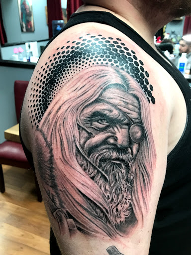 Explore male shoulder tattoo ideas, creative tattoo ideas in Phoenix, available at Wookie Style Tattoos